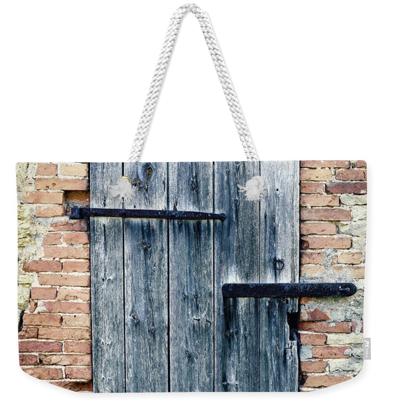 Arch Weekender Tote Bag featuring the photograph Old Wooden Door by Styf22