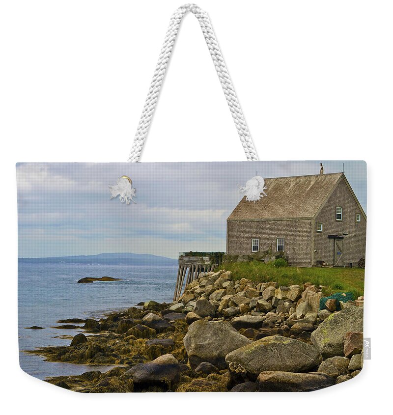 Nova Scotia Weekender Tote Bag featuring the photograph On the Edge by John Babis
