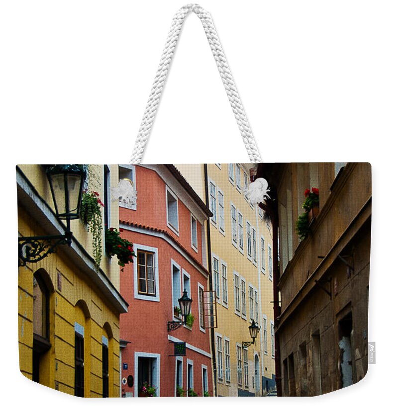 Photography Weekender Tote Bag featuring the photograph On the street of Prague by Ivy Ho