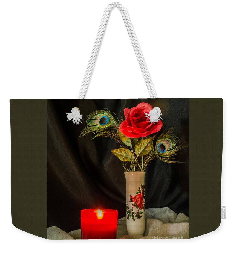 Still Life Weekender Tote Bag featuring the photograph One Red Christmas Rose by Donna Brown