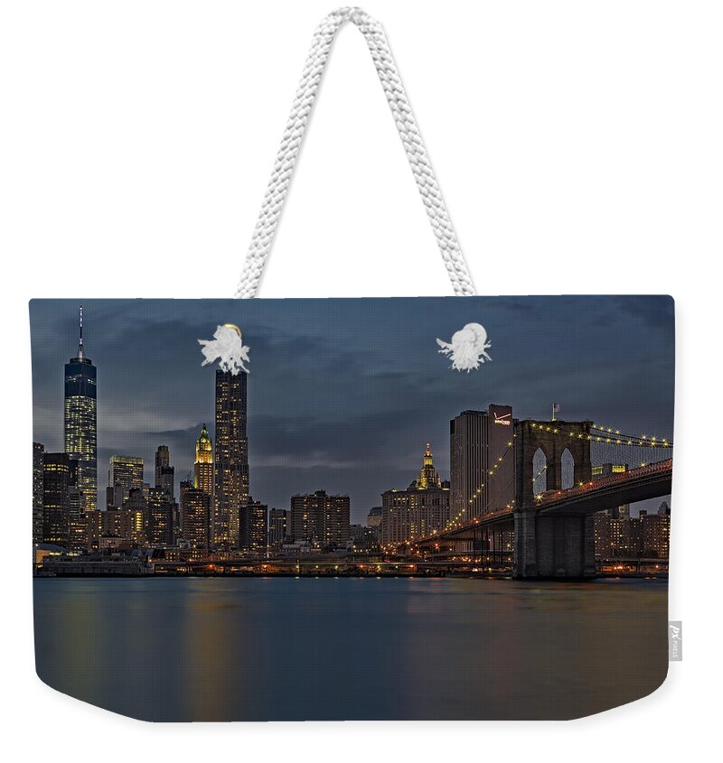 Brooklyn Bridge Weekender Tote Bag featuring the photograph One World Trade Center And The Brooklyn Bridge by Susan Candelario
