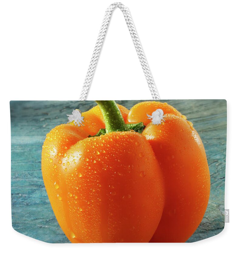 Food Weekender Tote Bag featuring the photograph Orange Bell Pepper by Paul Williams