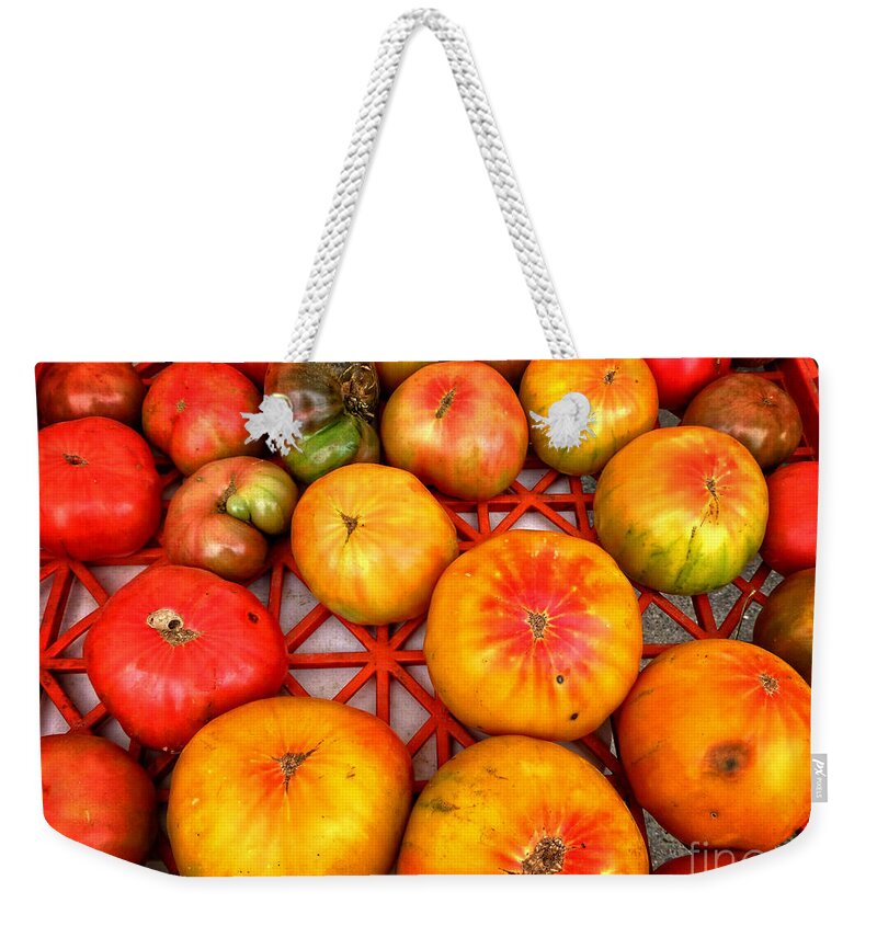 Red Weekender Tote Bag featuring the photograph Organic Heirloom Tomatoes by Dee Flouton