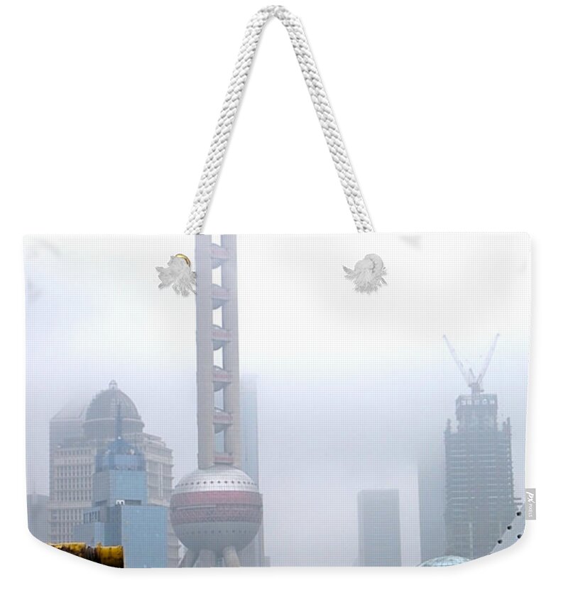 Oriental Pearl Tower Weekender Tote Bag featuring the photograph Oriental Pearl Tower Under Fog by Nicola Nobile
