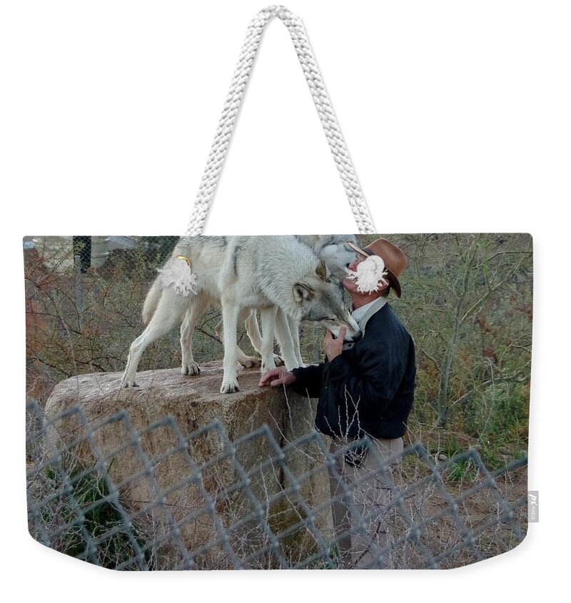 Out Of Africa Weekender Tote Bag featuring the photograph Out of Africa Friendly Wolves by Phyllis Spoor