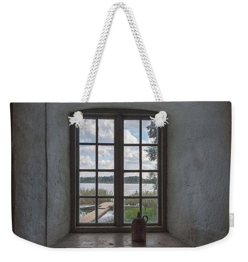 Outlook Weekender Tote Bag featuring the photograph Outlook by Torbjorn Swenelius