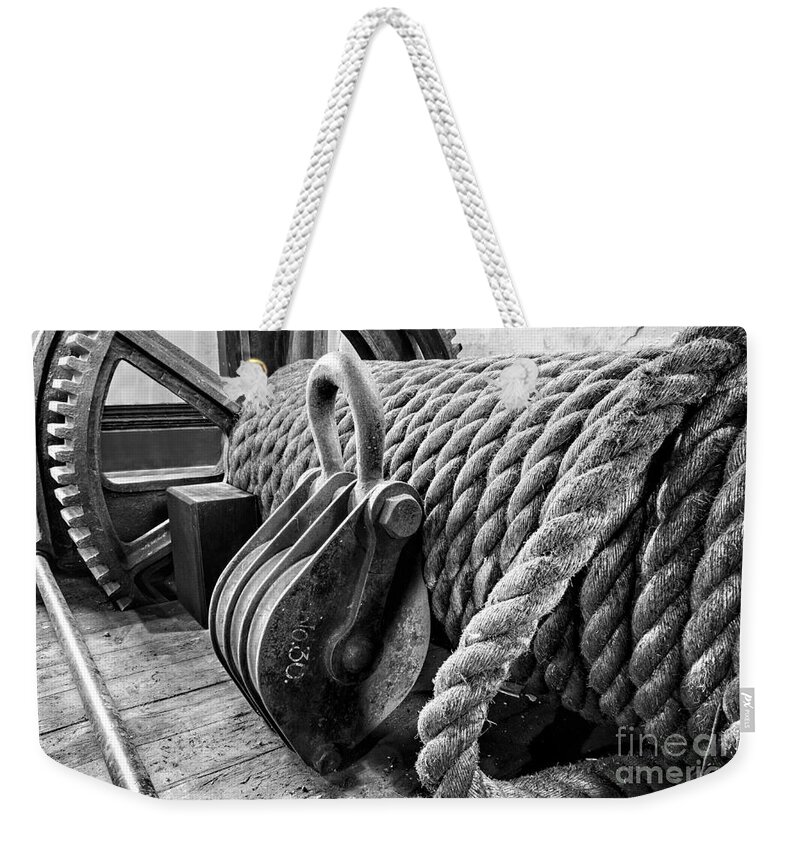 Rope Weekender Tote Bag featuring the photograph Overhead crane - mono by Steev Stamford