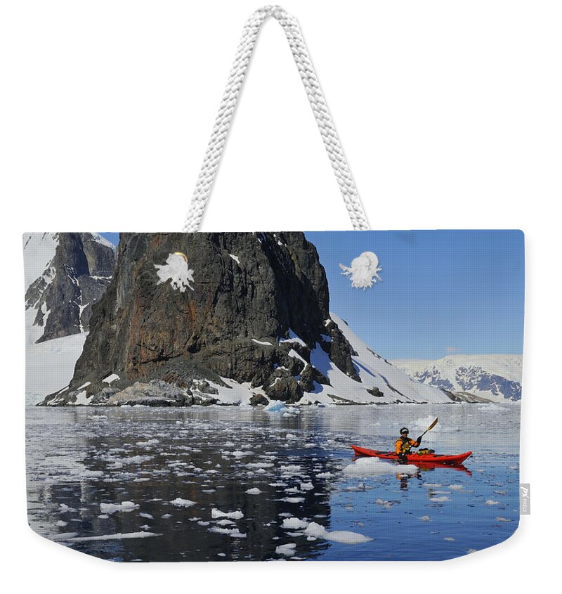 Ice Berg Weekender Tote Bag featuring the photograph Paddling Through Ice by Tony Beck