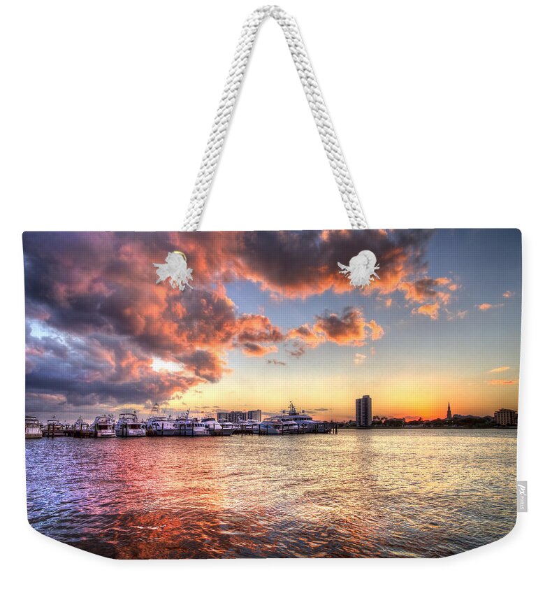 Boats Weekender Tote Bag featuring the photograph Palm Beach Harbor with West Palm Beach Skyline by Debra and Dave Vanderlaan