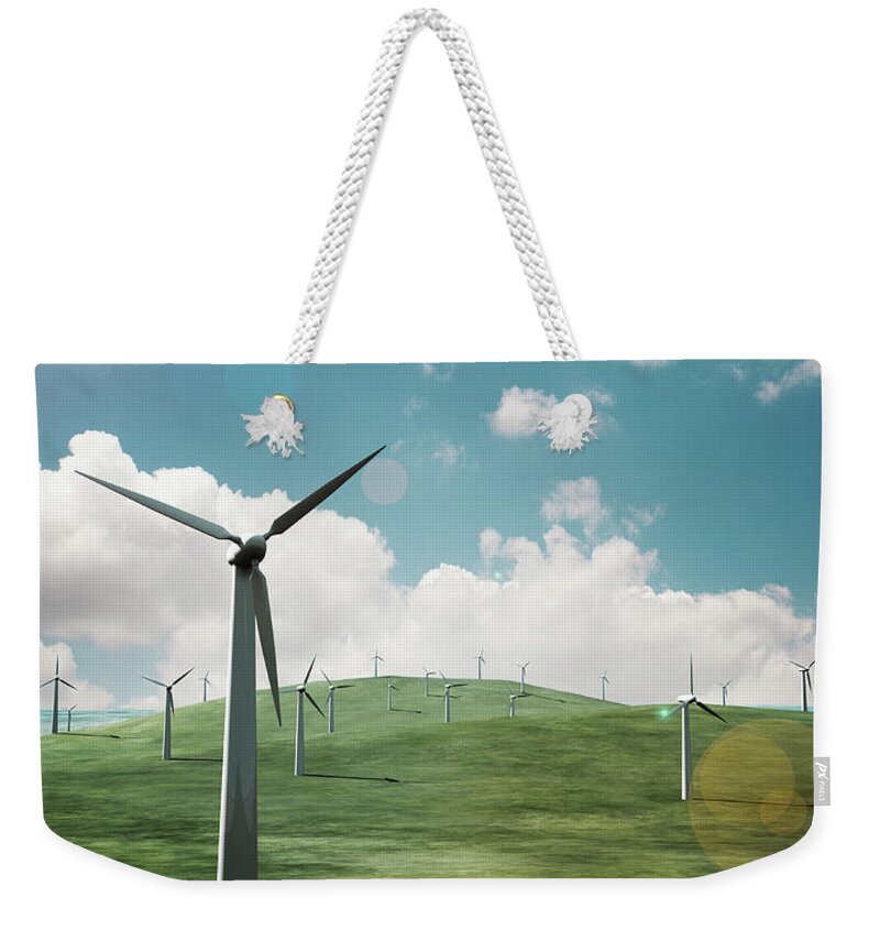 Scenics Weekender Tote Bag featuring the photograph Paper Airplane Flying Above The Wind by Hiroshi Watanabe