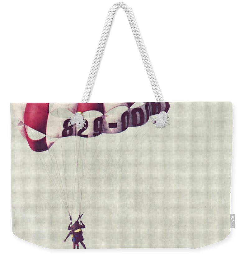 Parasailing Weekender Tote Bag featuring the photograph Parasailing the Caribbean by Melanie Lankford Photography