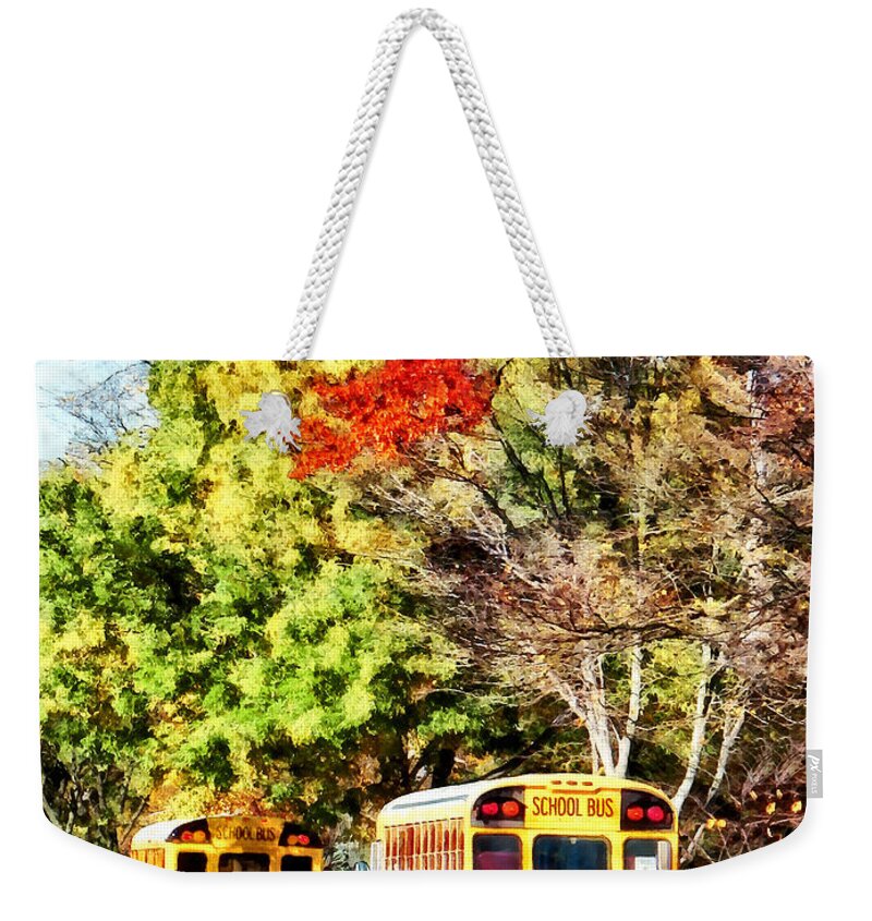 Bus Weekender Tote Bag featuring the photograph Parked School Buses by Susan Savad