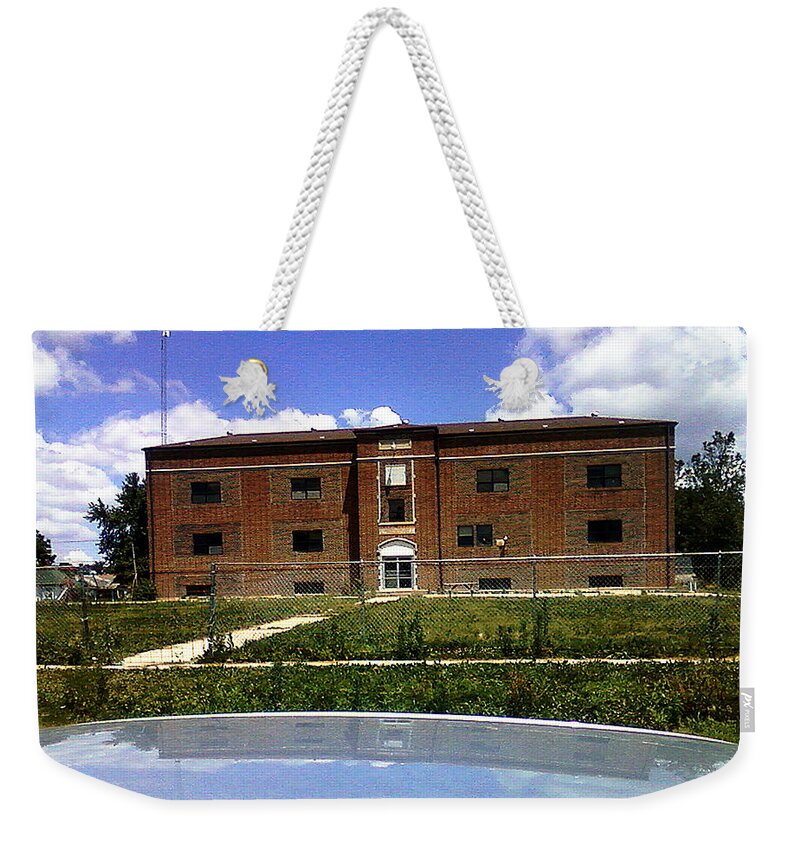 Brick Weekender Tote Bag featuring the photograph Past Reflections by Robyn Louisell