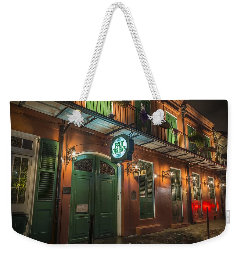 Pat O�brien�s Weekender Tote Bag featuring the photograph Pat OBriens New Orleans by David Morefield