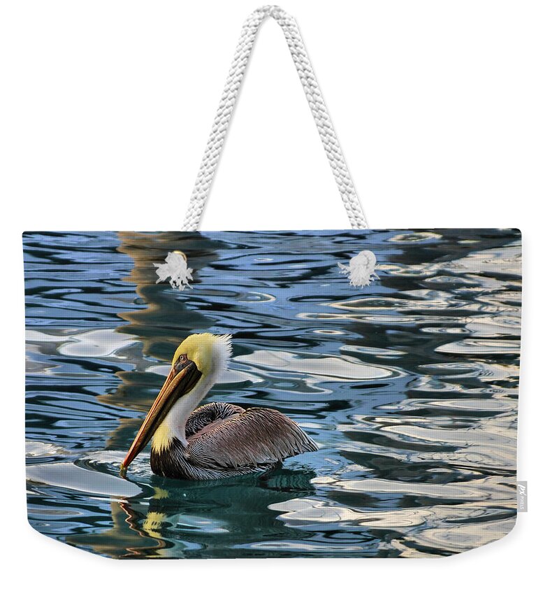 Bird Weekender Tote Bag featuring the photograph Pelican Monet by Debra and Dave Vanderlaan