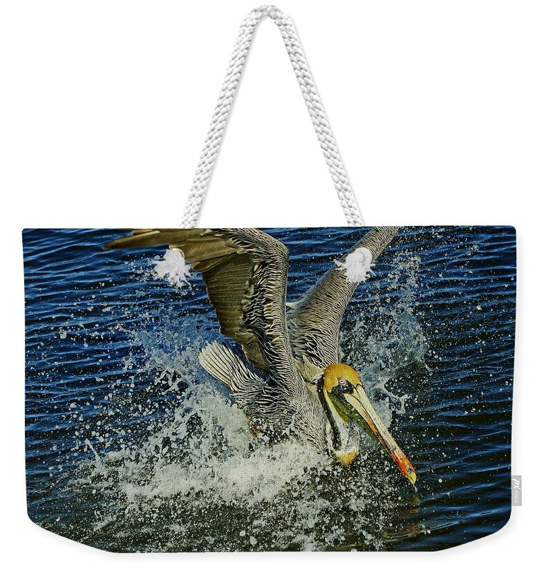 Pelican Weekender Tote Bag featuring the photograph Pelican Splash Landing by Larry Nieland