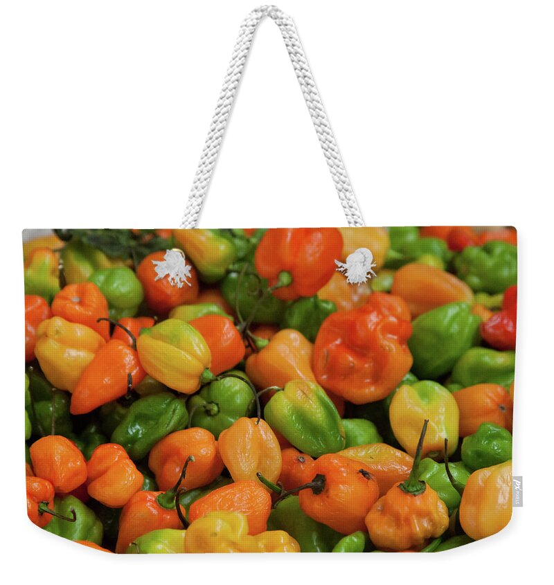 Orange Color Weekender Tote Bag featuring the photograph Peppers In Oaxaca Market by Jialiang Gao