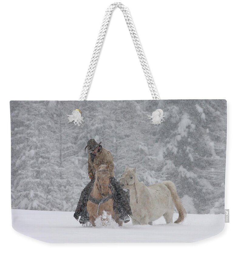 Cowboy Weekender Tote Bag featuring the photograph Persevere Through All by Diane Bohna