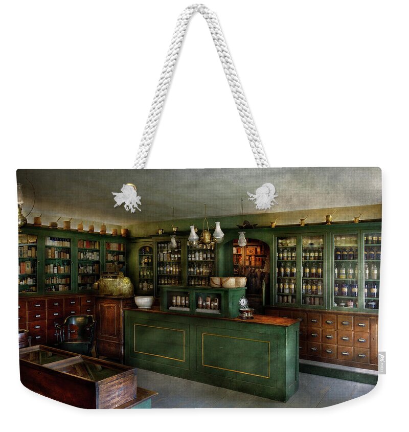 Apothecary Weekender Tote Bag featuring the photograph Pharmacy - The Chemist Shop by Mike Savad