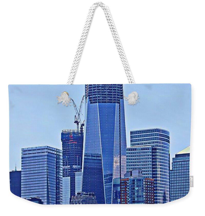 Freedom Tower Weekender Tote Bag featuring the photograph Phoenix Rising by Lilliana Mendez