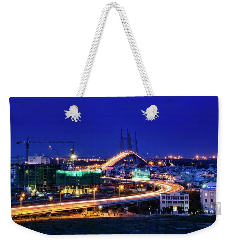 Ho Chi Minh City Weekender Tote Bag featuring the photograph Phu My Bridge by Photos By Andy Le