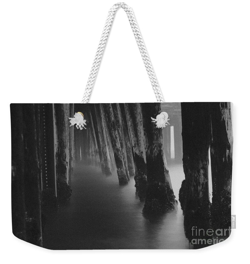 Pier Weekender Tote Bag featuring the photograph Pillars and Fog 1 by Paul Topp