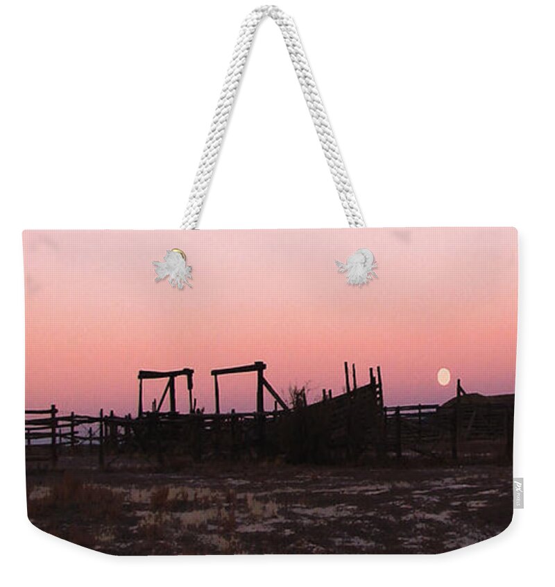 Corrals Weekender Tote Bag featuring the photograph Pink sunset over corral by Cathy Anderson