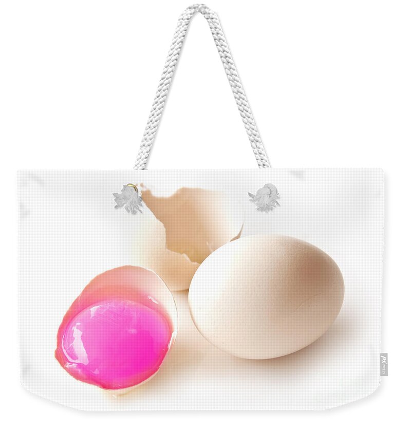 Egg Weekender Tote Bag featuring the photograph Pink Yolk egg by Delphimages Photo Creations