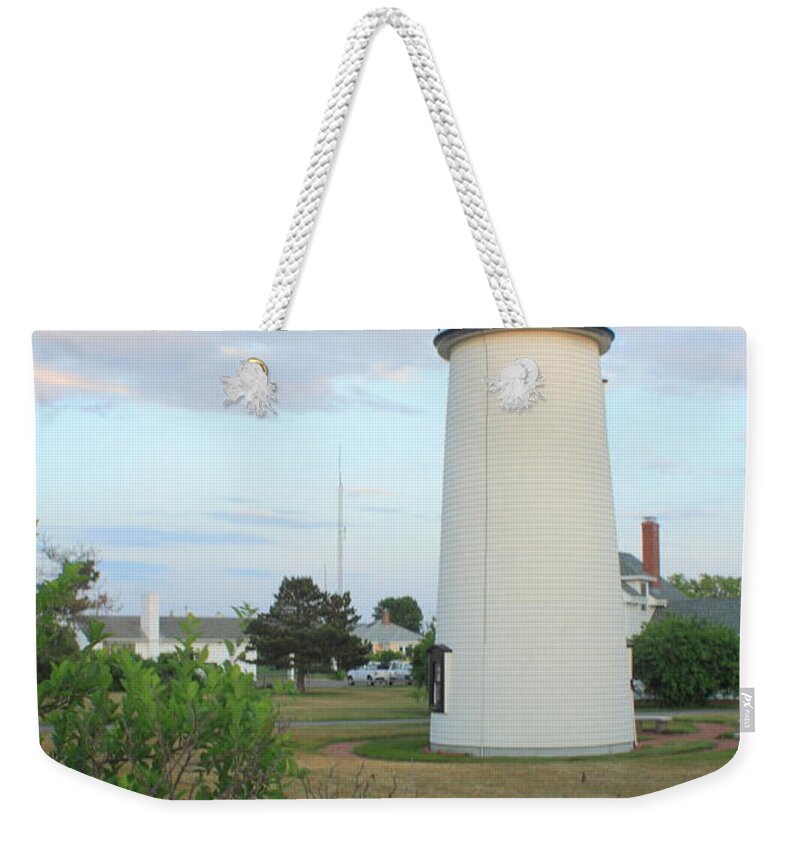 Lighthouse Weekender Tote Bag featuring the photograph Plum Island Lighthouse Sunset Flowers by John Burk