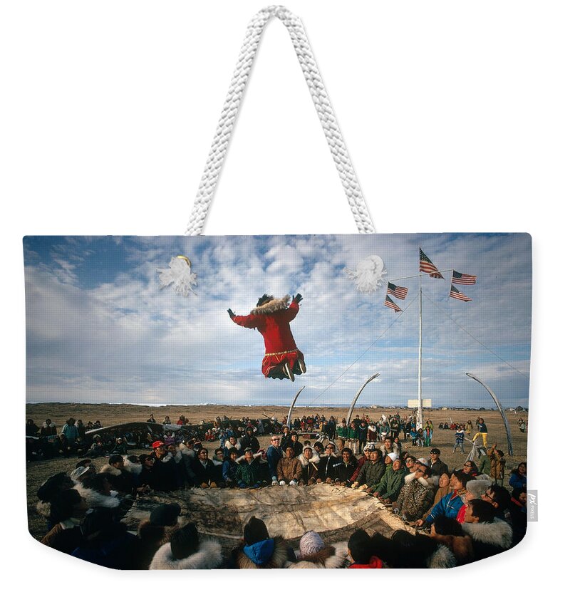 Alaska Weekender Tote Bag featuring the photograph Point Hope Whaling Festival by Gordon Gahan