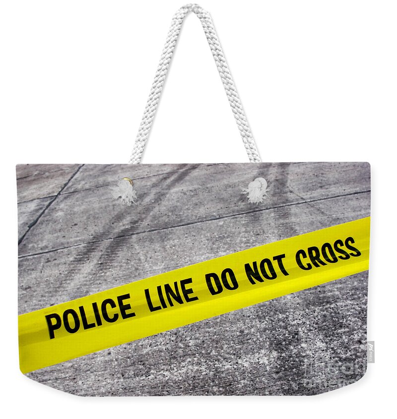 Police Line Weekender Tote Bag featuring the photograph Police Line by Olivier Le Queinec
