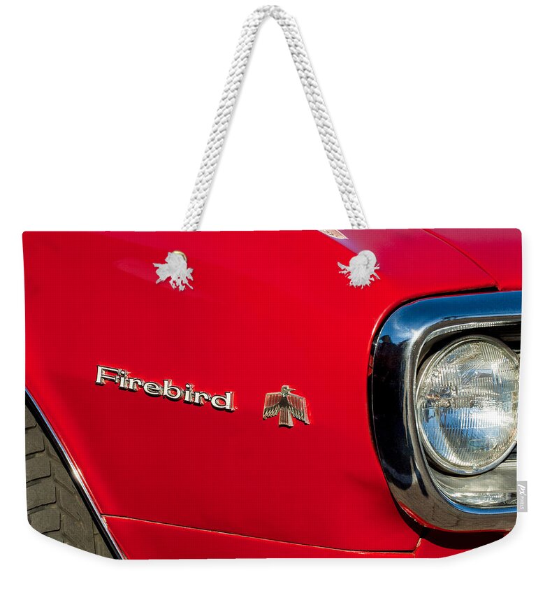 Pontiac Firebird Emblem Weekender Tote Bag featuring the photograph Pontiac Firebird Emblem by Jill Reger