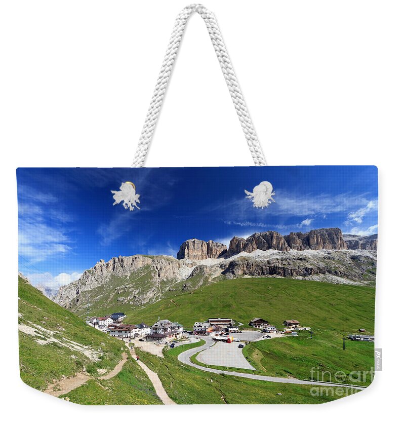 Alpine Weekender Tote Bag featuring the photograph Pordoi pass and mountain by Antonio Scarpi