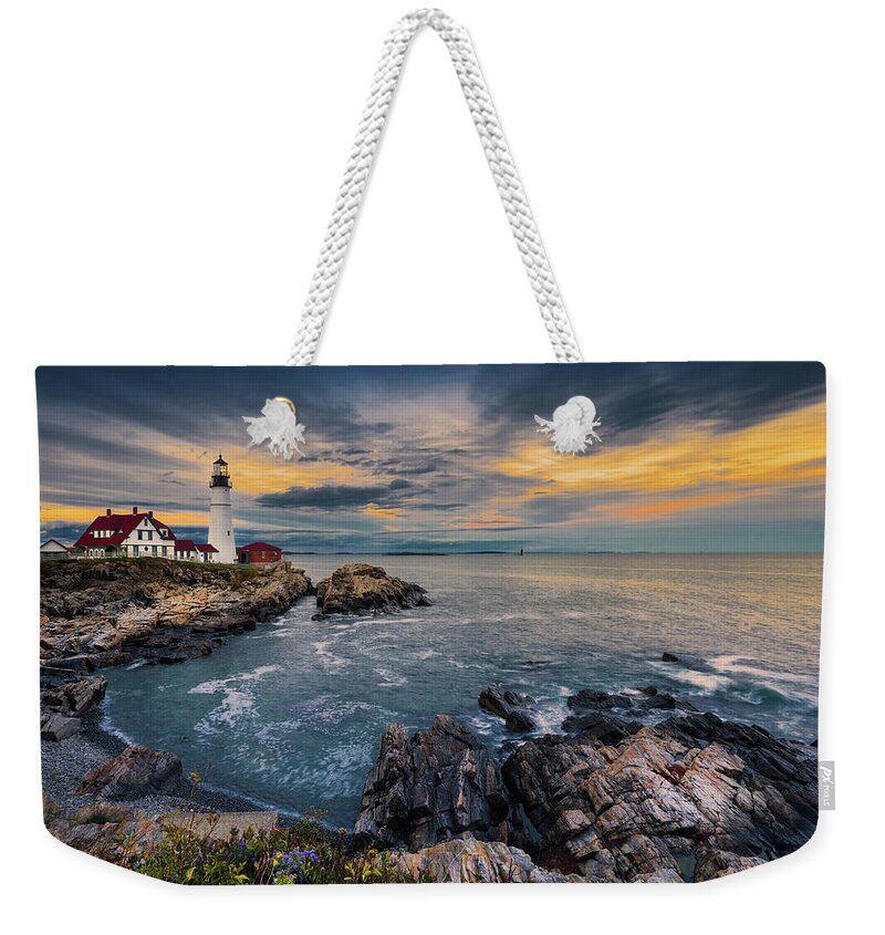 Tranquility Weekender Tote Bag featuring the photograph Portland Head Light by Noppawat Tom Charoensinphon
