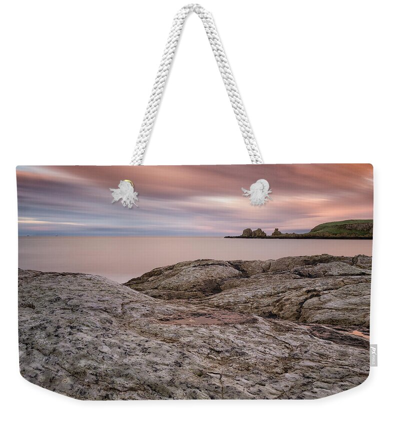 Isle Of Muck Weekender Tote Bag featuring the photograph Portmuck Sunset by Nigel R Bell