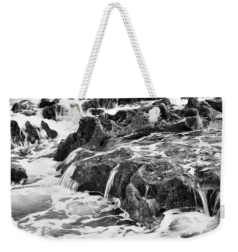 Water And Rock Photographs Weekender Tote Bag featuring the photograph Pouring Rocks by David Davies