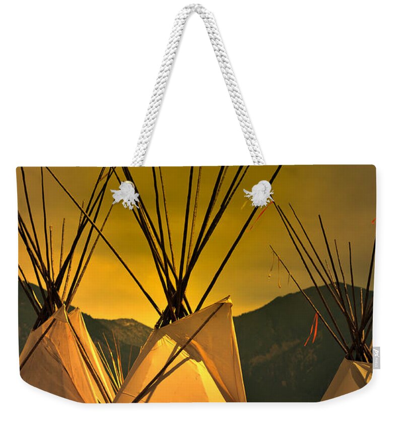 American Indian Weekender Tote Bag featuring the photograph Powwow Camp at Sunrise by Kae Cheatham