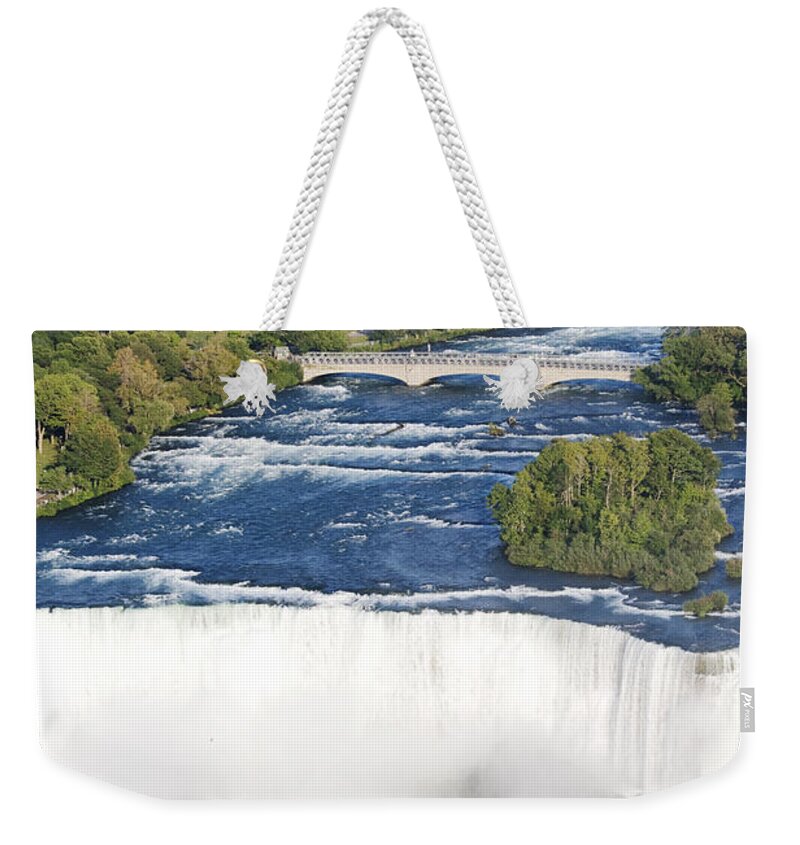 Blue Weekender Tote Bag featuring the photograph Powerful Bridal veil Falls with Niagara by Patricia Hofmeester