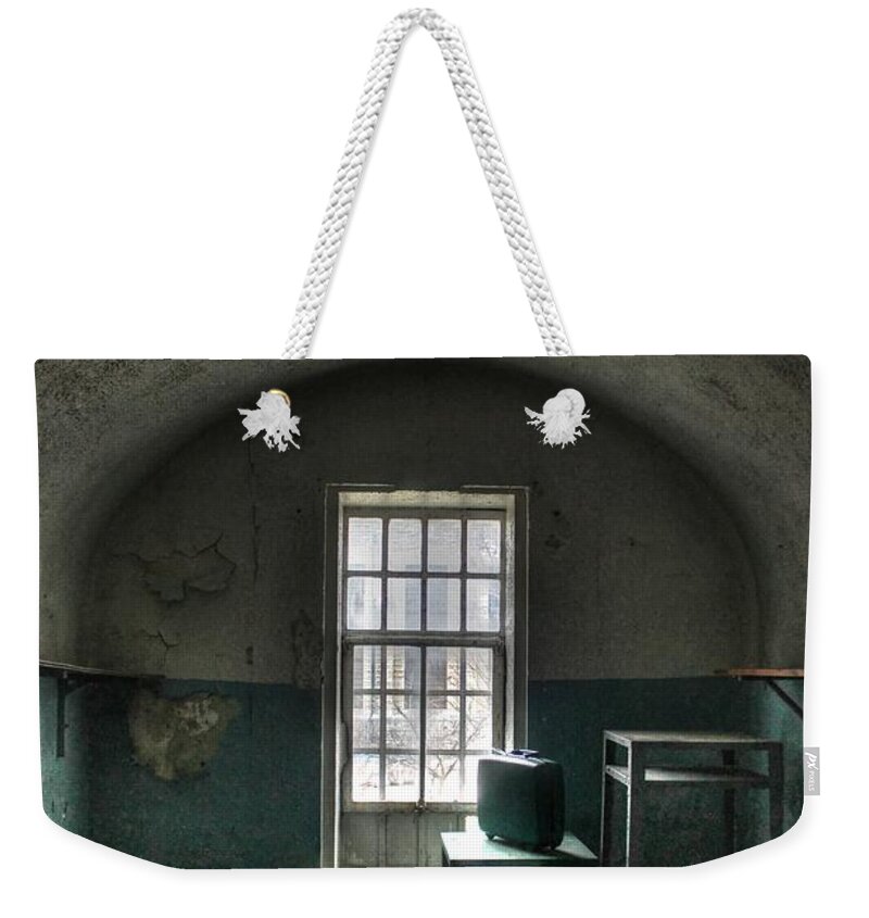 Prison Weekender Tote Bag featuring the photograph Prison Cell by Jane Linders