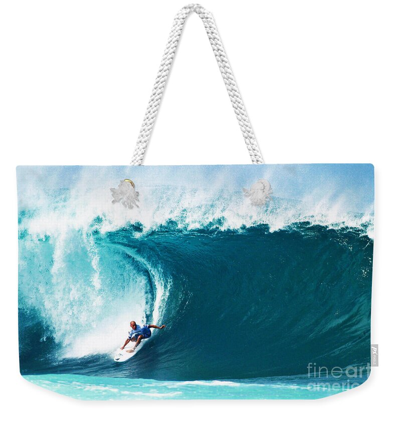 Kelly Slater Weekender Tote Bag featuring the photograph Pro Surfer Kelly Slater Surfing in the Pipeline Masters Contest by Paul Topp