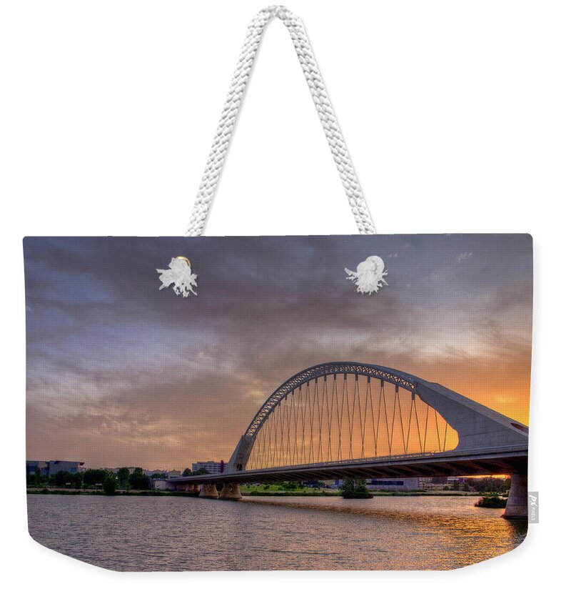 Merida Weekender Tote Bag featuring the photograph Puente de Lusitania II by Pablo Lopez