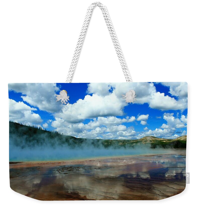 Yellowstone National Park Weekender Tote Bag featuring the photograph Puffy Clouds and Hot Springs by Catie Canetti