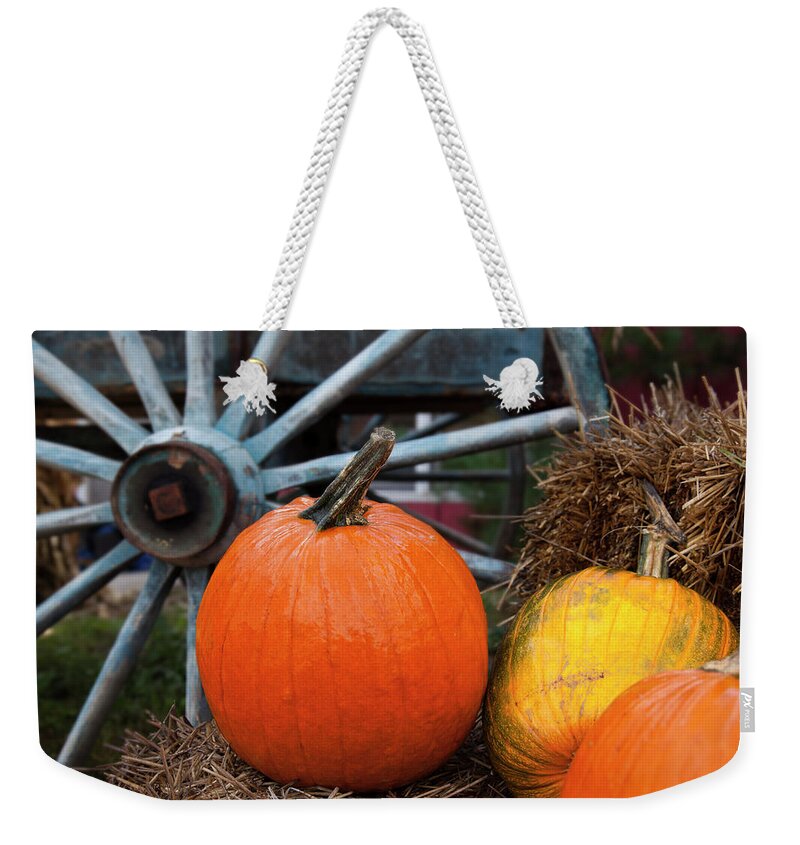 New England Weekender Tote Bag featuring the photograph Pumpkins And Wagon Wheel Stowe by Jenna Szerlag
