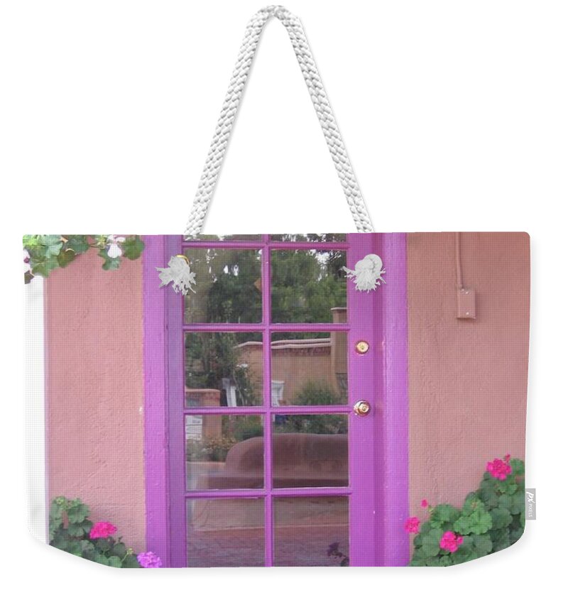 Adobe Weekender Tote Bag featuring the photograph Purple Door on Adobe Wall by Dora Sofia Caputo