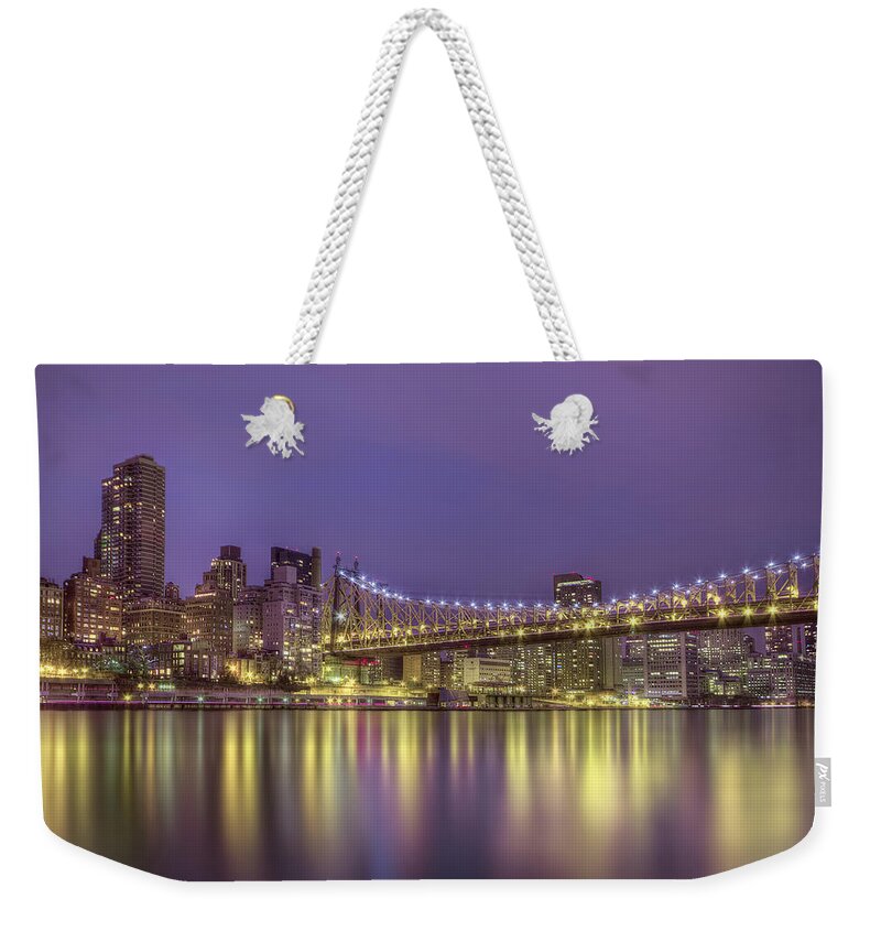 Queensboro Weekender Tote Bag featuring the photograph Radiant City by Evelina Kremsdorf