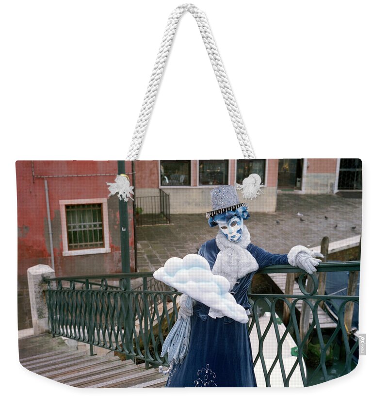 Venice Weekender Tote Bag featuring the photograph Rain mask in Murano by Riccardo Mottola