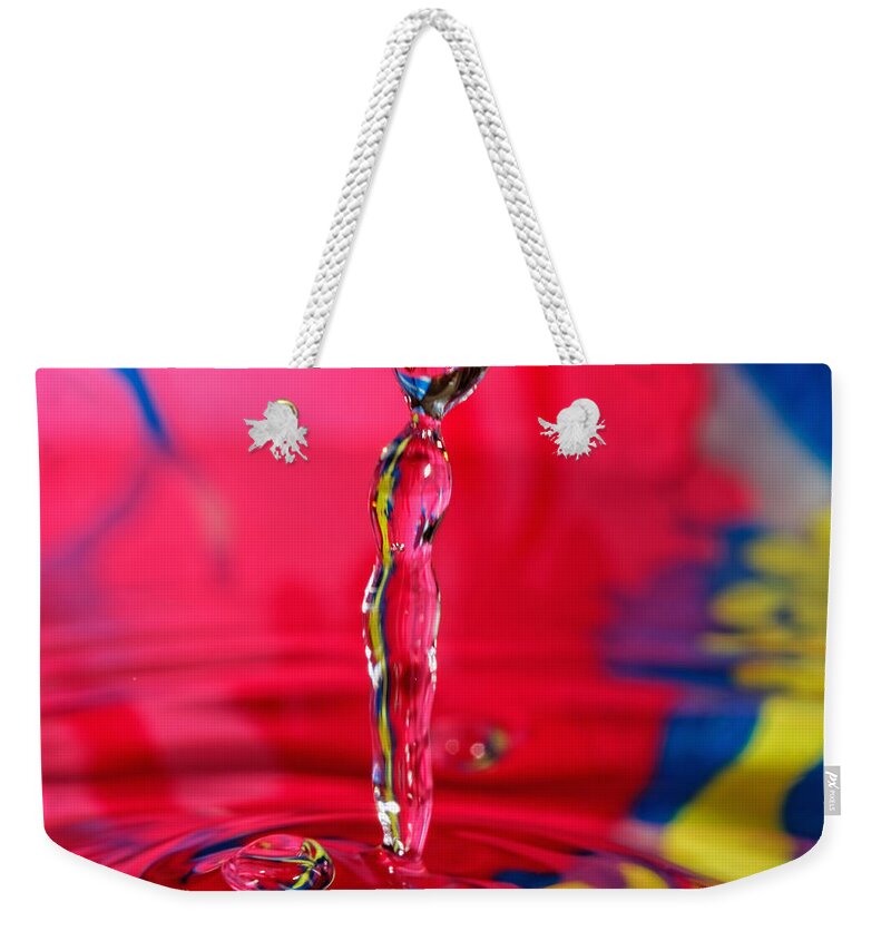  Abstract Weekender Tote Bag featuring the photograph Rainbow Drop by Peter Lakomy