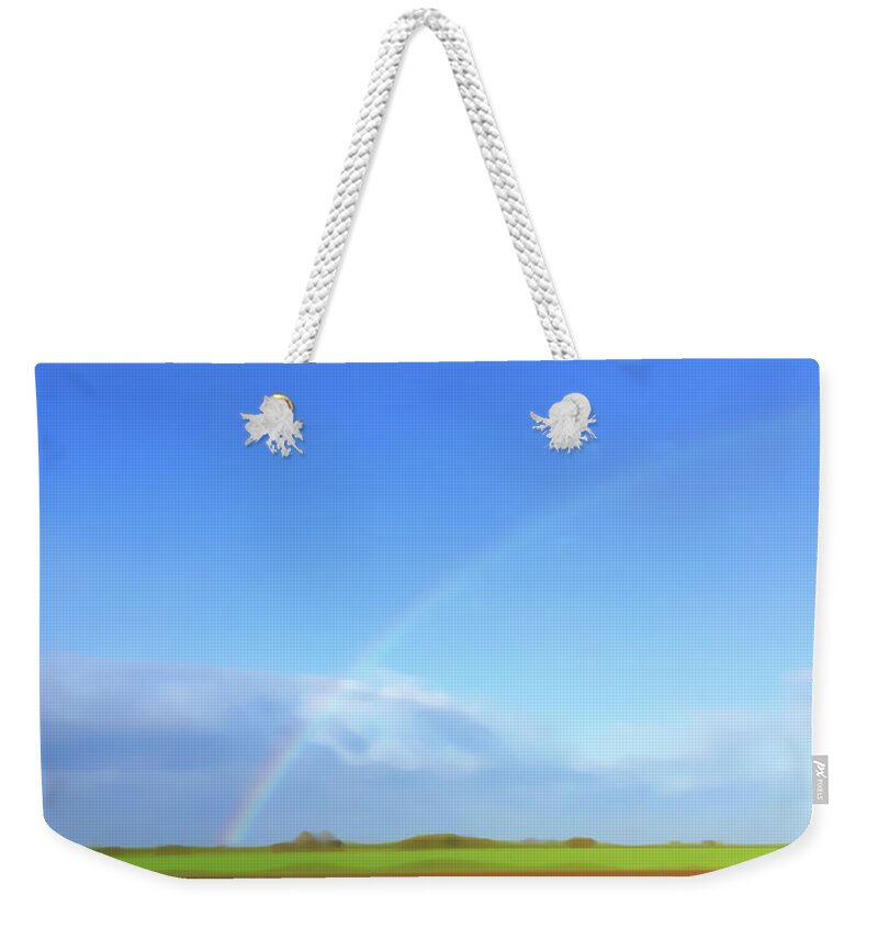 Beauty In Nature Weekender Tote Bag featuring the photograph Rainbow In Field by Ikon Ikon Images
