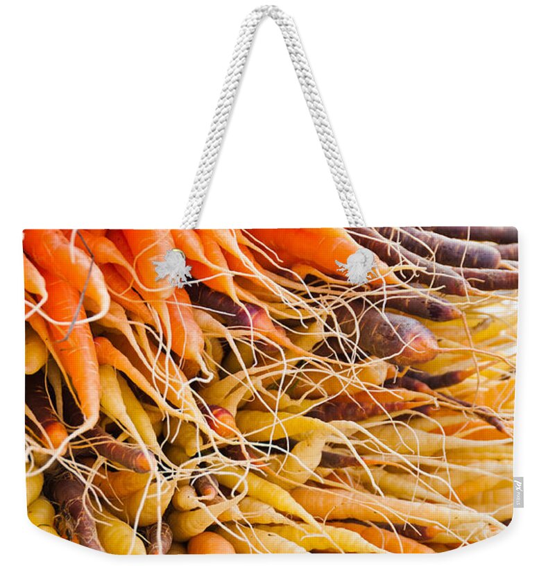 Carrots Weekender Tote Bag featuring the photograph Rainbow Roots by Cheryl Baxter