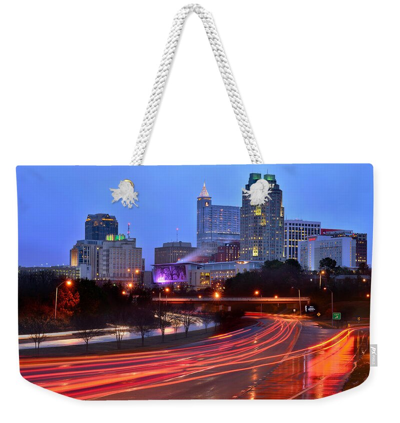 Raleigh Skyline Weekender Tote Bag featuring the photograph Raleigh Skyline at Dusk Evening Color Evening Panorama North carolina NC by Jon Holiday